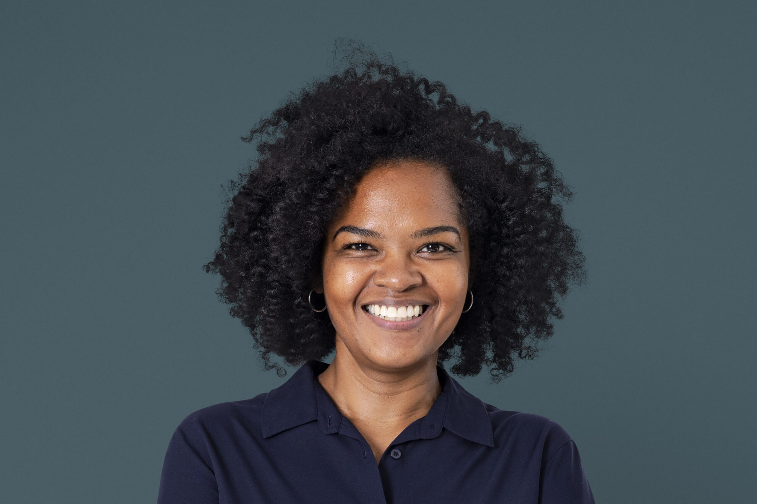 confident african businesswoman smiling closeup portrait for job